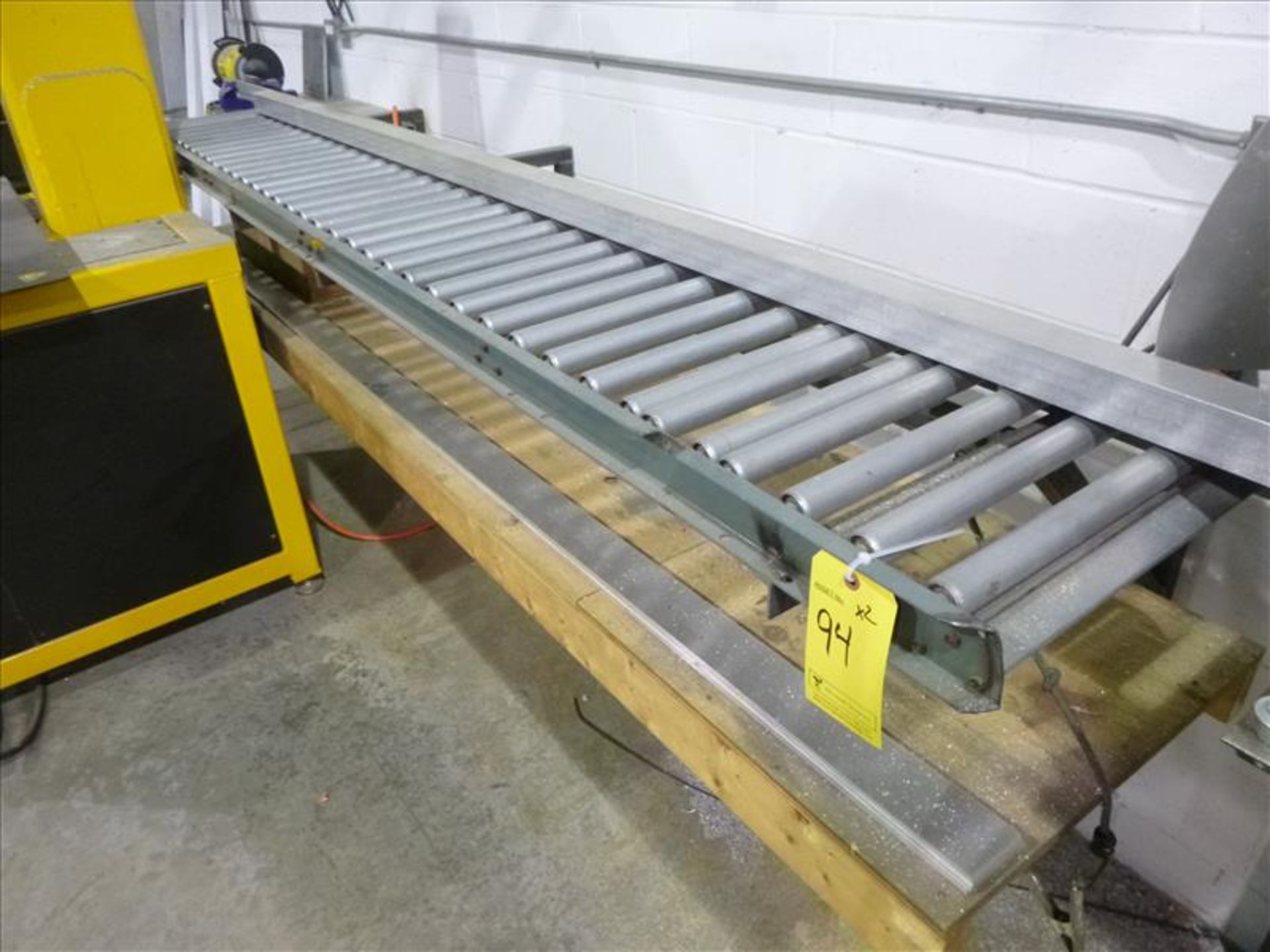 (2) Hytrol roller conveyors, 16" x 9' ea. c/w wall mounts