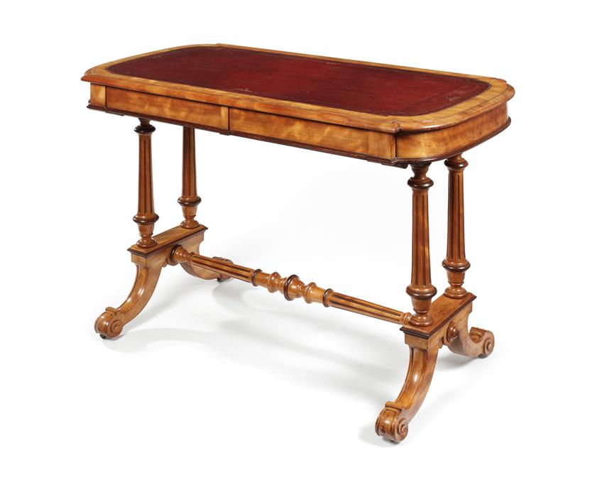 A Victorian satinbirch and purplewood carved writing table