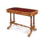 A Victorian satinbirch and purplewood carved writing table