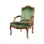 A Louis XV carved walnut fauteuil à la reine