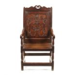 A Queen Anne oak armchair, early 18th century, Welsh