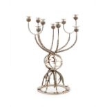 An imposing nine-light silver candelabrum centrepiece by Gerald Benney, London, 1976