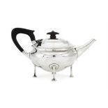 A stylish Arts & Crafts silver teapot by A.E. Jones, Birmingham