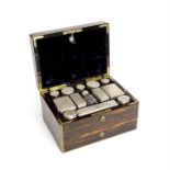 A mid Victorian coromandel and brass bound fitted dressing box by Leuchars of Piccadilly