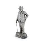 An extremely heavy cast silver statuette of Prime Minister Winston Churchill