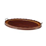 A George III mahogany and satinwood banded oval tray