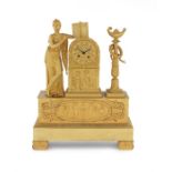 A 19th century French Empire style gilt bronze mantel clock
