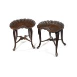 A pair of late 19th century stained beech shell stools