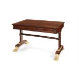A Regency rosewood and brass inlaid writing table in the manner of Gillows
