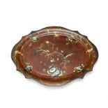 A large mid 19th century japanned polychrome decorated tôleware tray on later stand