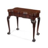 A George III mahogany carved triple-fold tea/card table