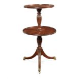 A Regency mahogany two tier dumb waiter attributed to Gillows