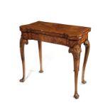 A George II burr walnut card table in the manner of Benjamin Crook