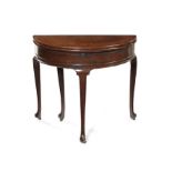 A George II mahogany demi-lune tea table