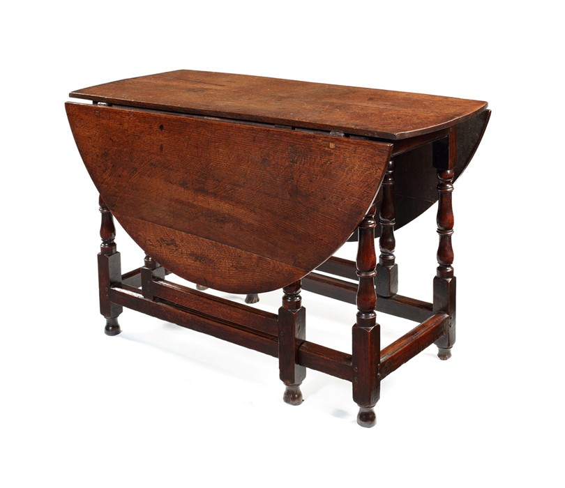 A Queen Anne oak gate-leg table