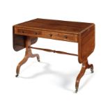 A Regency mahogany, satinwood and tulipwood crossbanded sofa table