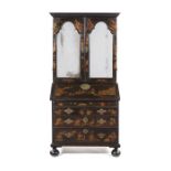 A Queen Anne black japanned bureau cabinet