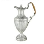 A George III silver bead-edged ewer by William Holmes & Nicholas Dumee, London, 1773