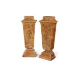 A pair of Victorian figured walnut and sycamore floral marquetry pedestals