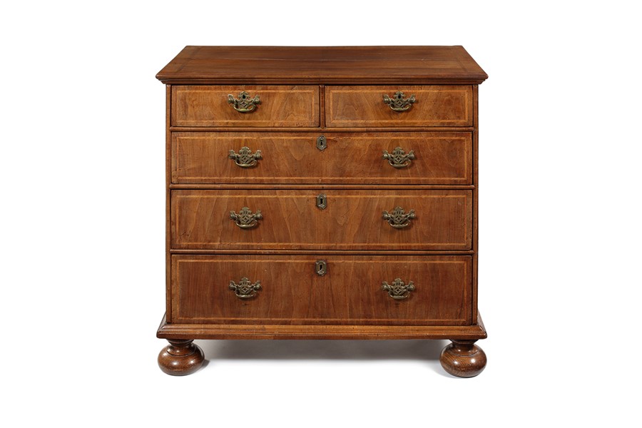 A Queen Anne walnut crossbanded and featherbanded chest