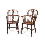 A matched pair of Victorian elm and ash Windsor armchairs