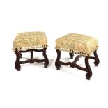 A pair of Flemish walnut stools, 19th century
