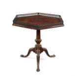 A mahogany tripod table