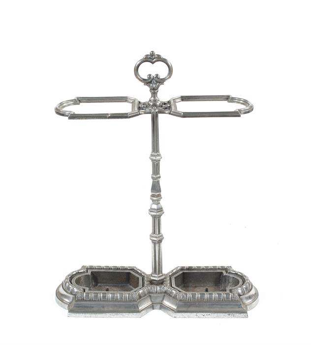 A Victorian polished steel twin umbrella/ stick stand