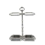 A Victorian polished steel twin umbrella/ stick stand