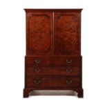 A George III mahogany linen press attributed to Philip Bell