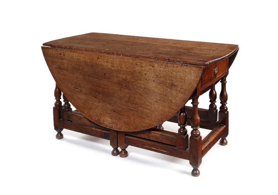 A large George III oak double gate-leg table