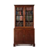 A George III mahogany bookcase cabinet