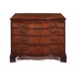 A George III mahogany serpentine chest possibly by Thomas Chippendale