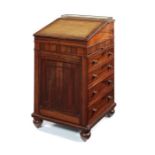 A Victorian rosewood Davenport attributed to Gillows