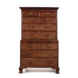 A George III figured mahogany chest on chest attributed to George Speer