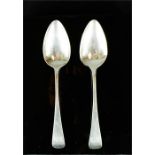 A pair of silver serving spoons London 1814, 3.72toz, initialled WGM.