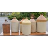 A group of stoneware jars, stamped with various breweries, together with a group of excavated