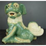A Chinese ceramic Dog of Fo, 40cm high, 46cm length