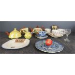 A group of Devonware/Torquayware, including butter dish, jug, teapot, and matching tea pot and