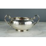 A silver sugar bowl by Goldsmiths Company 12 Regent Street, London, 10.69toz.