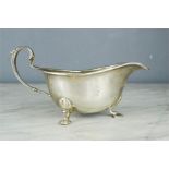 A silver sauce boat, Birmingham 1936, initialled S, 4.90toz. 7cm high,