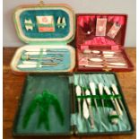 Three Edwardian and later sewing sets, each boxed with either mother of pearl or bone handled