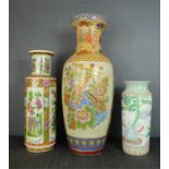 Three ceramic vases, of various size. Tallest 59cm high