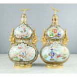 A pair of Chinese cloisonne gourd form vases, 30cm high, 14cm diameter