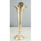 A silver stem vase, with flared rim and weighted base. 23cm high, 9cm wide