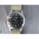 A Longines style military wristwatch, with WWW and government arrow markings verso.