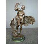 A bronze figure of a man with eagle, 38cm high.