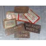 A group of WWII Air Raid Warden posts, signs and plaques.