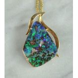 An 18ct gold and dark/boulder opal necklace, 7.7g total.