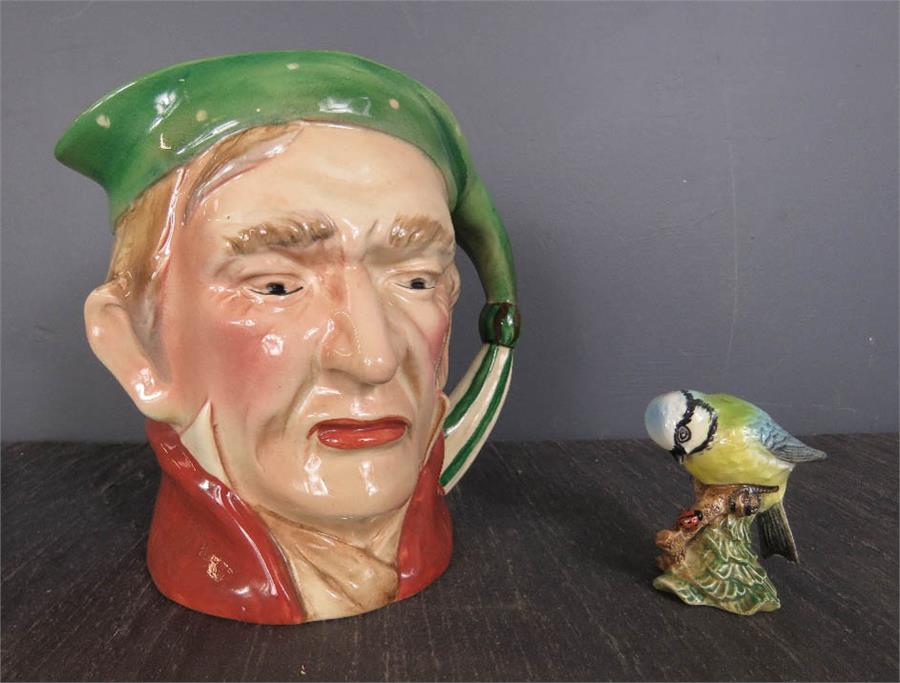 A Beswick Blue Tit and a Beswick character jug.